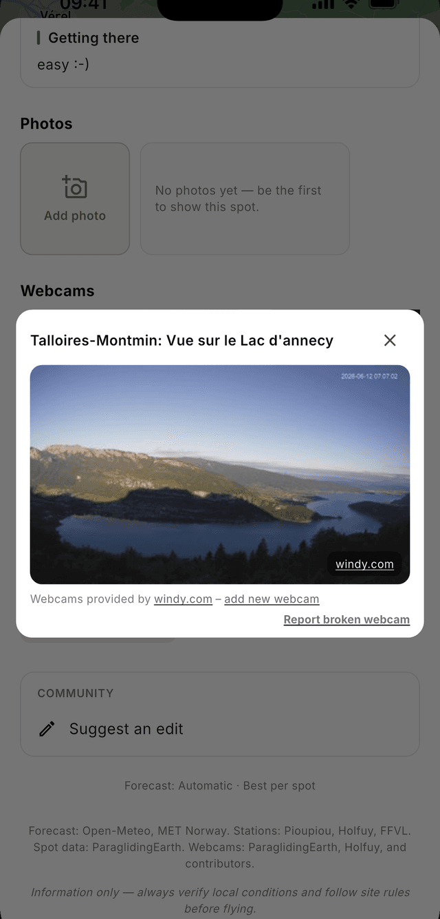 A spot page showing a live webcam of Lake Annecy